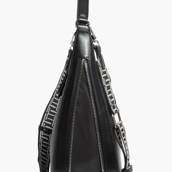 Tahari
Minetta Expandable
Crescent Bag NWT - Picture 4 of 6